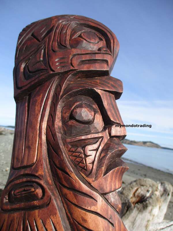 Warrior and salmon hat wall art carving by Gino Seward