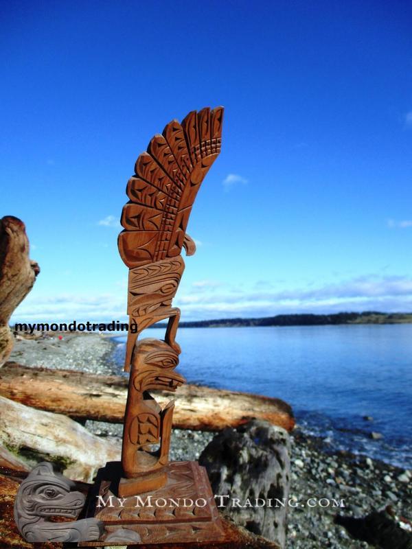 Eagle and killer whale totem pole by Nancy Williams