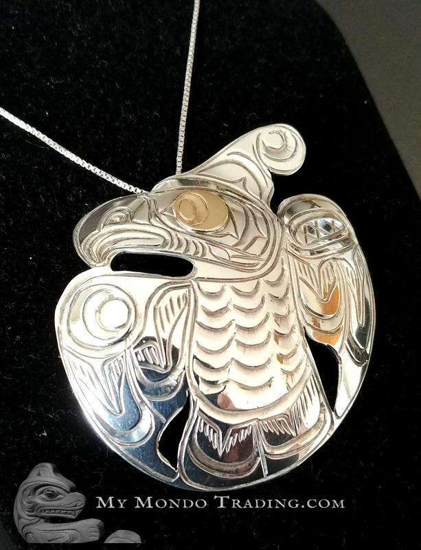 Sterling Silver with gold eye Thunderbird pendant/brooch
