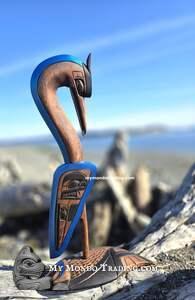 Graceful patience: Heron on Salmon base by Charles George Sr. 