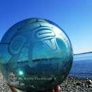 Haida Whale on large green Japanese Glass Float by Francis Pollard