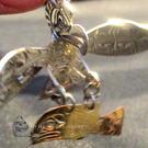 Eagle (silver) catching salmon (gold) pendant by Solomon Seward